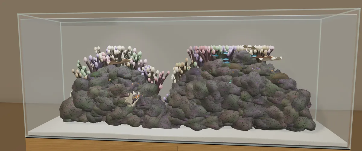 A reef of live rock and pale corals with open water around it